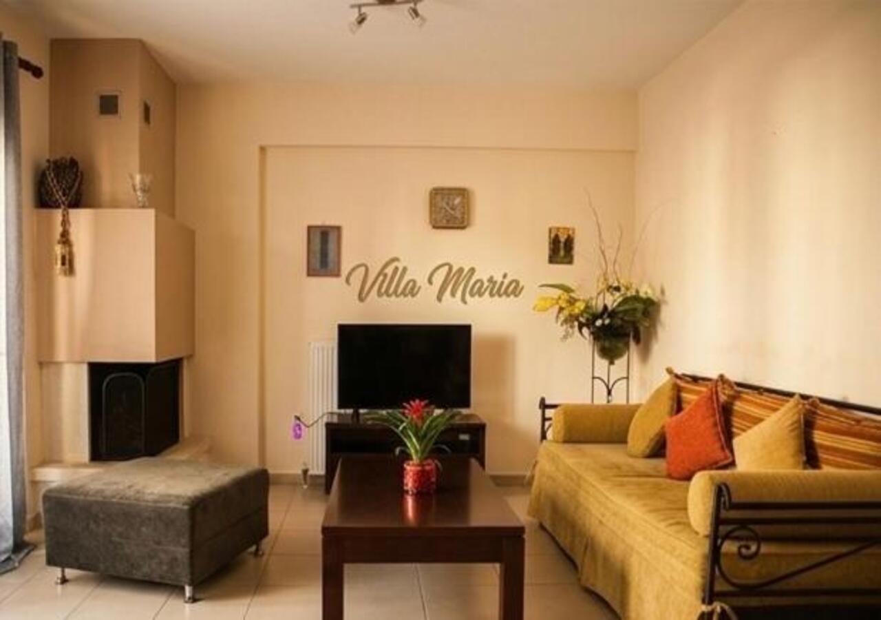 Lounge area with sofa and fireplace