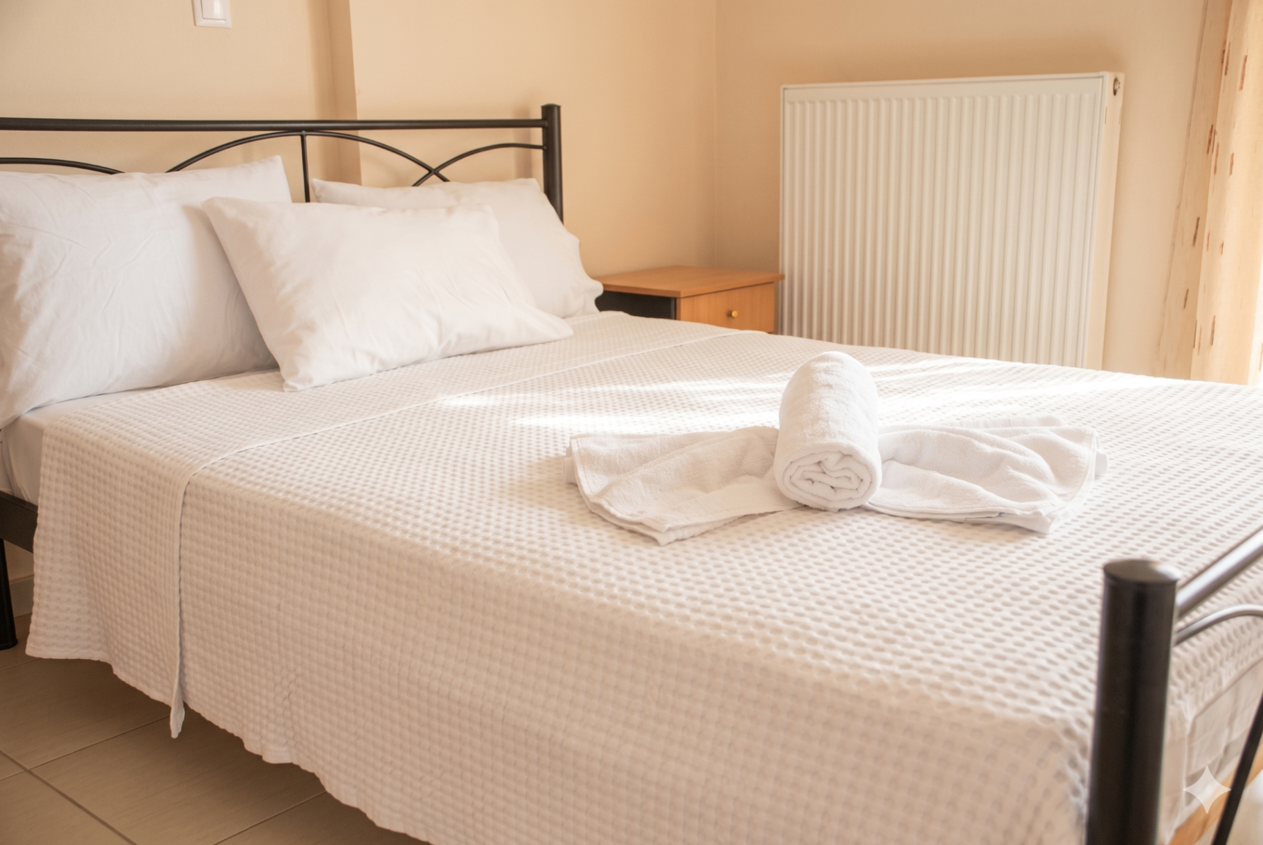 Bright bedroom with fresh linens